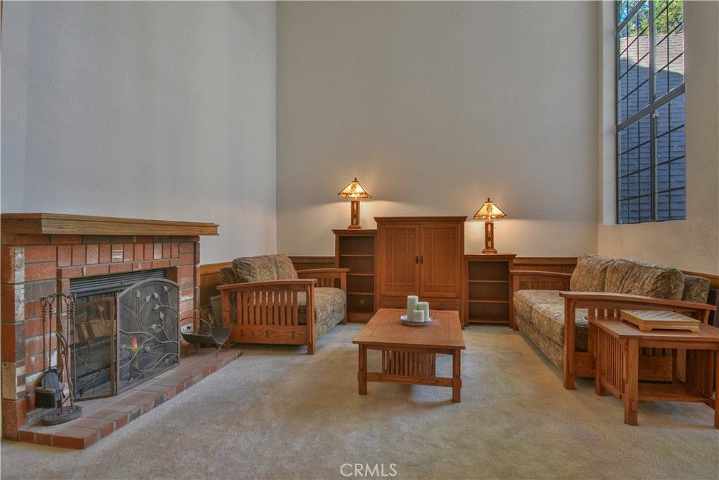 Photo of 27494 White Fir Dr, Lake Arrowhead, CA 92352 (MLS # IG25266738)