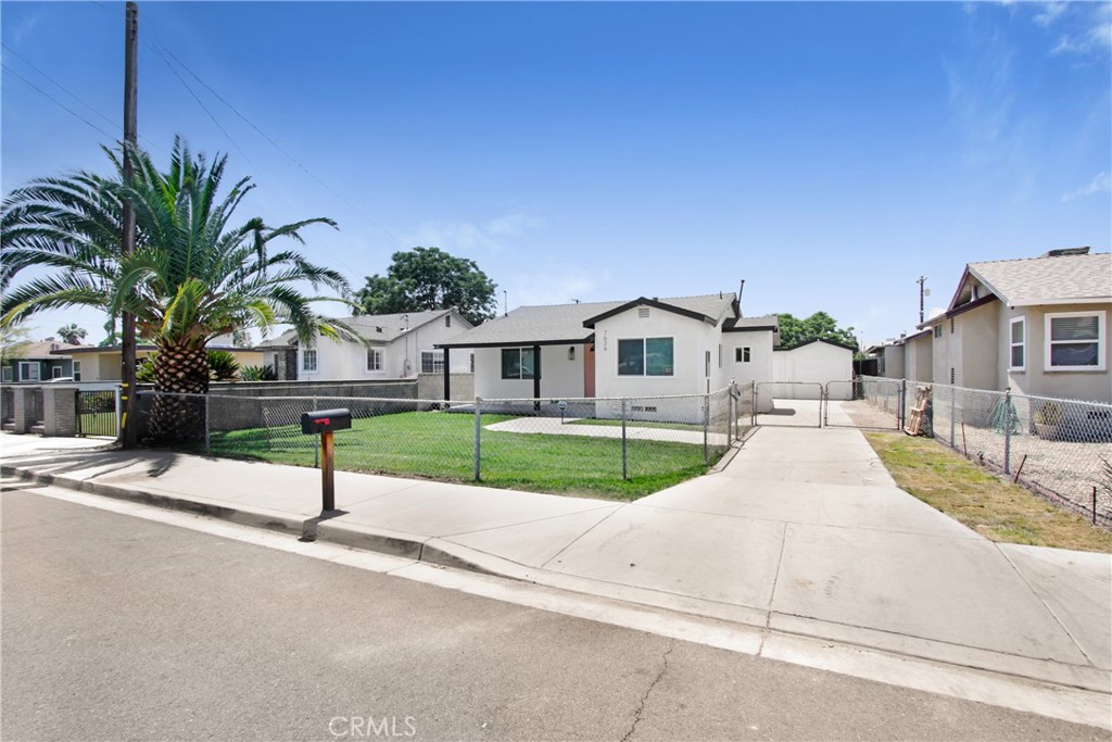 Sharp and beautifully remodeled TWO HOMES ON ONE LOT PLUS A SEPARATE ONE CAR GARAGE W/STORAGE AREAS WITH TWO SEPARATE LAUNDRY ROOMS. This one is a winner! Terrific curb appeal with gated entrance and long driveway leading to one car garage. FRONT HOUSE OFFERS: Spacious 2 bedrooms/1 bath light/bright living room, beautiful kitchen w/ custom cabinetry and quartz counters. Both bedrooms offer ample living/closet space. Bathroom has been beautifully remodeled with custom cabinetry, quartz counters and custom tile and hardware. Beautiful hard wood-like flooring thru out the home with custom hardware/lighting. NEW Mini Split AIR CONDITIONING BACK HOUSE OFFERS: Spacious 2 bedrooms/1 bath light/bright living room, beautiful kitchen w/ custom cabinetry and quartz counters. Both bedrooms offer ample living/closet space. Bathroom has been beautifully remodeled with custom cabinetry, quartz counters and custom tile and hardware. Beautiful hard wood-like flooring thru out the home with custom hardware/lighting. NEW Mini Split AIR CONDITIONING THIRD STRUCTURE OFFERS: ONE CAR GARAGE, plus TWO SEPARATE STORAGE/LAUNDRY ROOMS . . . ONE FOR EACH HOME. Enclosed/ low maintenance backyard with ample room for gardening, work trucks, recreational vehicles, etc. NO NEED TO PREVIEW!