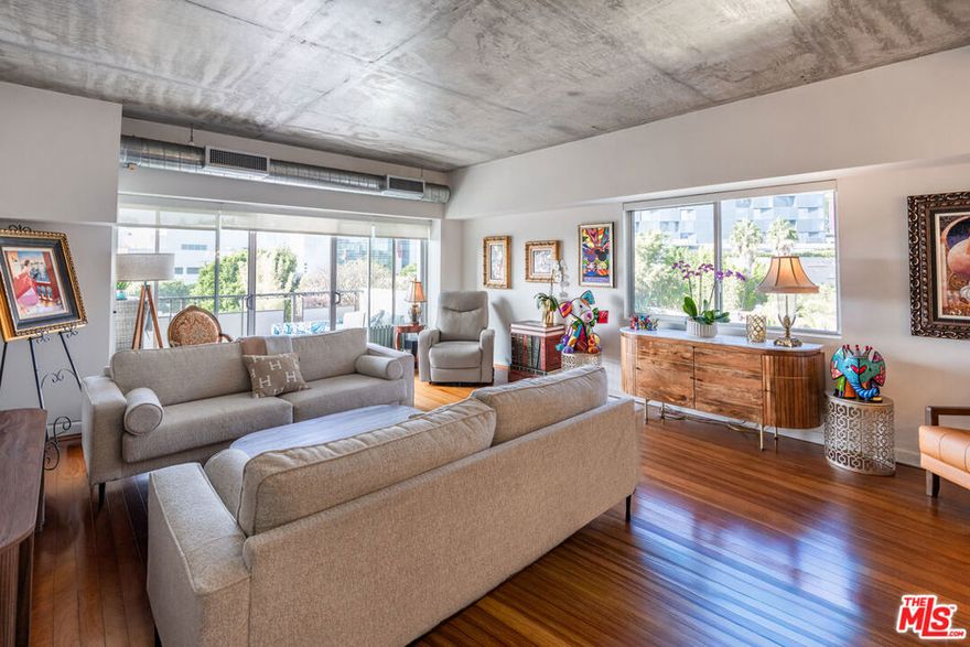 Experience stunning VIEWS of the Hollywood Hills in this corner unit, located in the full-service Westview Towers. This 2 bedroom + 2 bathroom condo features hardwood flooring and industrial-style ceilings. a kitchen with high-end finishes and newer appliances, a formal dining area, a wrap-around breakfast bar, modern baths, and more. The building offers an array of top-notch amenities including, but not limited to: 24-hour security, valet services for residents and guests, heated pool and spa, saunas, communal BBQs, a private dog park, a residents only-gym, etc. Immerse yourself in a luxury lifestyle, moments away from some of the most well known shopping, wellness, and entertainment destinations in Los Angeles.