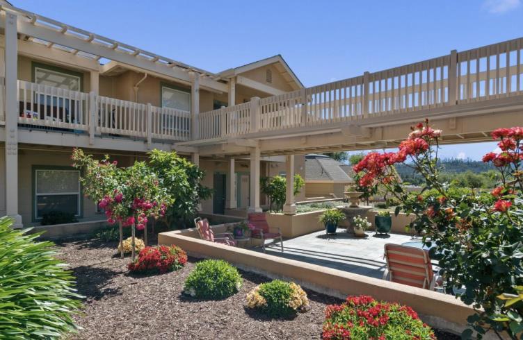 Stunning End Unit with Expansive Views in Prime Scotts Valley Location! Prepare to be impressed by this light-filled end unit offering panoramic views and a rare blend of privacy and walkability. Enjoy a charming front garden and patio, plus serene vistas of mature trees from the kitchen, living room, and primary bedroom. The open-concept layout features a bright kitchen with granite countertops, stainless steel appliances, and a cozy fireplaceall flowing out to a spacious deck with tranquil tree-top views. Stylish laminate flooring, updated bathrooms, in-unit laundry, fresh paint, crown molding, recessed lighting, high ceilings, and a garden window are just a few of the thoughtful details that make this home stand out. Community amenities include gated entry, elevator access, garage parking, individual storage, a pool, and a BBQ area. Located just steps from Skypark, scenic trails, the library, Farmers Market, transit center, post office, and an array of local shops and restaurants. A commuter's dreamjust minutes to Highway 17 and a short drive to Santa Cruz beaches!