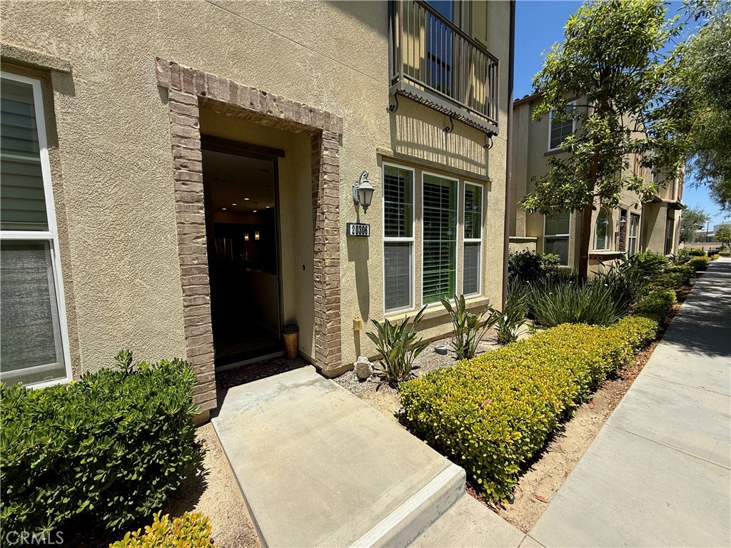 The perfect townhome located in the prestigious guard gated "Aldea at Porter Ranch" community. Never been rented with new carpet just installed. One full bedroom and full bath downstairs, ready for the in-laws. High end stone flooring in Kitchen and family room. Open light and bright family room and kitchen. The kitchen has granite countertops, large island big enough to sit at, every appliance the cook ever wanted, including stainless refrigerator. Upstairs the master suite includes a walk-in closet. Also the laundry room upstairs includes washer and dryer. Large back/side enclosed side patio. The double car garage is attached and the tankless water heater is there. The common area is close by and is one of the biggest and best in Porter Ranch with multiple pools and more. Just next door is the almost new "Vineyards Shopping Center" with - Whole Foods, multiple restaurants including the famous Lure Fish House, Nordstroms, See's Candy and a Movie Theater. Porter Ranch is also home to a very large YMCA and the Porter Valley Country Club.