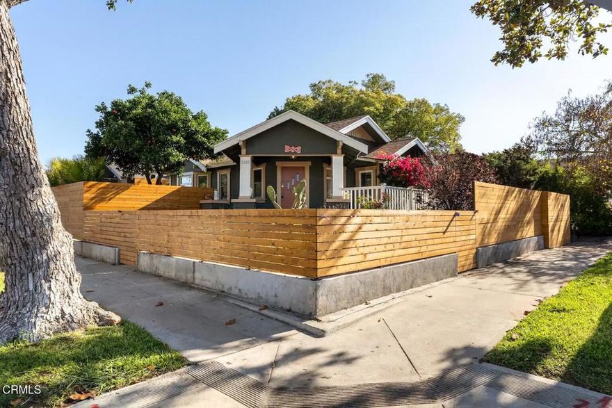Situated on a corner lot, this fully fenced and private 1918 Craftsman blends historic charm with fresh, modern updates. Natural light fills every room, accentuating the open living and dining spaces, warm wood floors, and thoughtful design details throughout.The kitchen features stainless steel appliances, quartz counters, and classic white cabinetry. Both bedrooms offer peaceful retreats, while the bathroom combines timeless style with contemporary finishes. Outside, lush landscaping and trees create an inviting setting for morning coffee or evening gatherings under the string lights.Located just 15 minutes from the restaurants and nightlife along Broadway and 20 minutes from Belmont Shore, this home offers easy access to Long Beach City College, local parks, and all the best of coastal living