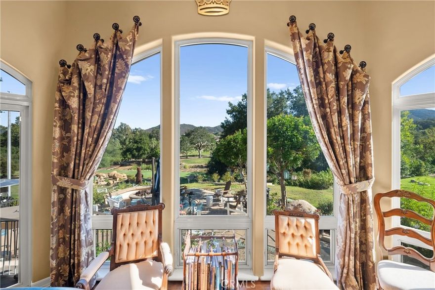 Luxury Estate on the 7th Tee | Welcome to the ultimate entertainer’s dream home at 22285 Bear Creek Dr. N in the prestigious guard-gated community of Bear Creek Golf Club—a private oasis nestled in the heart of Murrieta. Positioned along the 7th tee, this luxurious estate spans over 6,100 sq. ft., showcasing exceptional design, expansive living spaces, and breathtaking golf course views. Inside, the home features 6 bedrooms with four on the first level, and 4.5 baths. The home is thoughtfully laid out across three levels. The main floor boasts elegant formal living and dining areas, a generous family room with fireplace and wet bar, and a chef-inspired kitchen with Sub-Zero appliances, double ovens, a large center island, in-kitchen dining nook, desk area, and abundant cabinetry. Four bedrooms, including the expansive owner’s suite, are located on this level, offering comfort and convenience.
Upstairs, a private office with balcony access provides an ideal work-from-home retreat.
The lower level is an entertainer’s paradise, featuring a huge theater room with seating for over 12, a private hidden wine cellar, an additional bedroom and bath, and direct courtyard access—perfect for hosting unforgettable gatherings.
Outdoors, enjoy a beautifully landscaped paver patio, built-in BBQ, fire pit, and ample space for a future pool. The 4-car garage offers plenty of room for vehicles, storage, and tools.
Bear Creek is renowned for its challenging Jack Nicklaus-designed golf course, as well as its world-class amenities including fitness center, tennis, pickleball, bocce, pool, and spa. Located minutes from shopping, dining, top-rated schools, hiking and biking trails, and the Santa Rosa Plateau Nature Reserve.

Key Features:

5 Bedrooms | 4.5 Bathrooms | 6,100+ Sq. Ft.
Private Theater Room (seats 12+)
Hidden Wine Cellar
Chef’s Kitchen w/ Sub-Zero Appliances
Owner’s Suite on Main Level
Upstairs Office & Balcony
4-Car Garage
Golf Course Views off the 7th Tee
Guard-Gated Community with Premium Amenities
This exceptional estate is a rare opportunity to live and entertain in one of Murrieta’s most exclusive communities. Come experience the lifestyle only Bear Creek can offer. Buyer to verify all information including square footage and lot size. Broker, agents and seller do not guarantee accuracy of public records or MLS data. Sellers have information that may be different then public records for square footage. Buyers to verify accuracy.