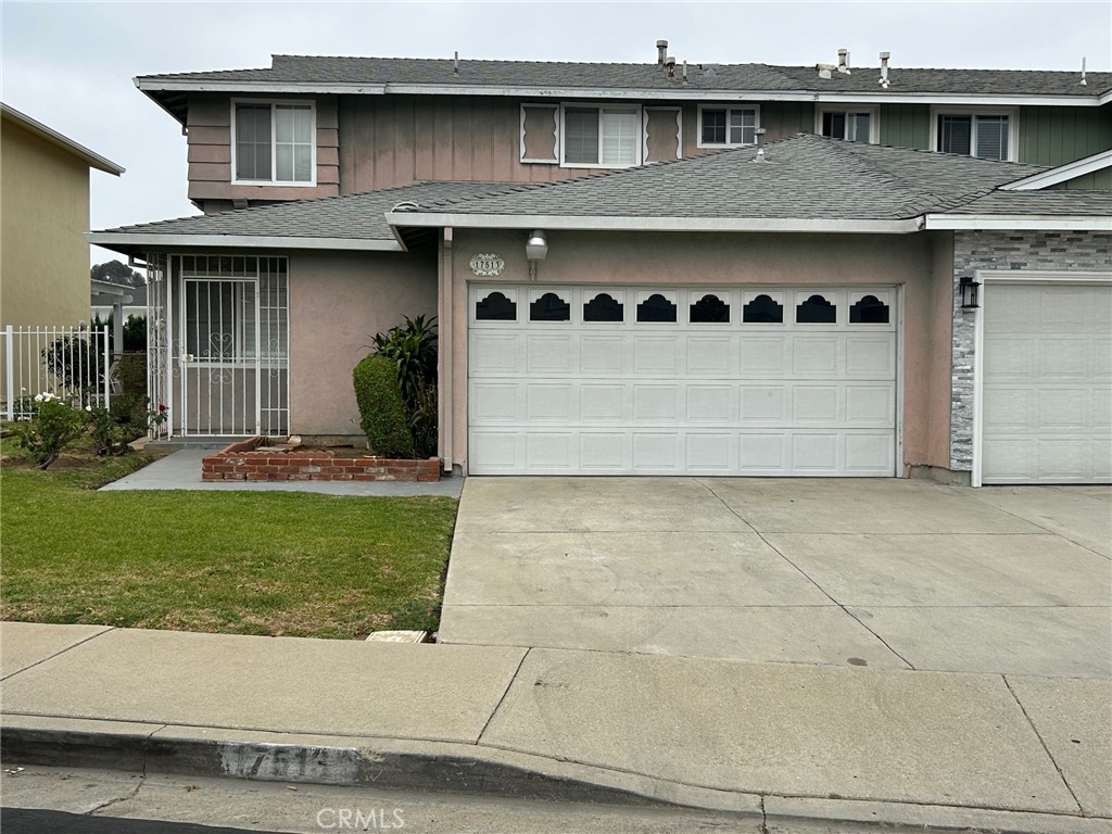 Located in one of the nicest neighborhoods on a quiet street in Carson. Come and see this spacious home complete with 4 bedrooms, one of which is on the ground floor and two bathrooms. Occupants can enter at the front porch or you have direct garage access. The systems have been well cared for as the family has always stayed on top of maintenance. Each home on the street has an attached private garage. There is a nice unpermitted family room not included in the sq. footage. The home does need a fresh coat of paint inside and out, but this will allow the new owner to choose their favorite colors as they make this space their own. The neutral carpet is in great condition and there is plenty of storage for you to take advantage of. Located near a beautiful city park and has nearby freeway access.