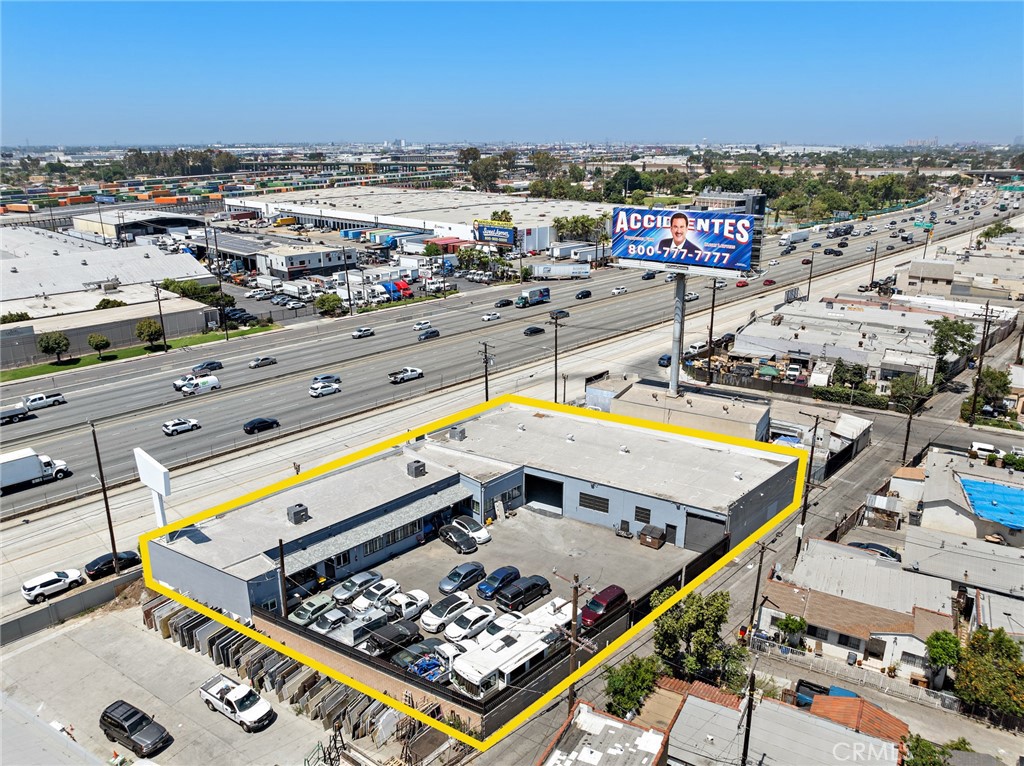 Exceptional commercial building that could be for a warehouse use featuring gated, fully fenced parking with wide rear access-ideal for large vehicle entry via alley. Situated in a prime location at the northeast quadrant of the I-5 and 710 freeway interchange, with seemless connectivity to the 10, 60, 101, and 605 freewlays. The property boasts 150 feet of street frontage aligned with the I-5 freeway, providing outstanding visibility to heavy North and Southbound rooftop billboard signage and front-facing display sign frames. Recent upgrades include a brand-new roof, three new 5-ton Hvace packaged units, freshly interior and exterior paint, new twin-section metal gates, newly paved asphalt, and wood-style vinyl flooring in the office areas. An excellent opportunity for an owner-user ofr investor seeking maximum exopsure and functionality.