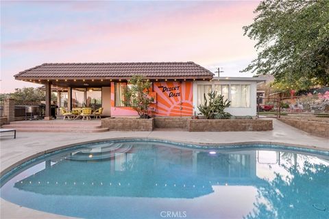 Photo of 7333 Camino Del Cielo Trl, Yucca Valley, CA 92284 (MLS # JT26141365)