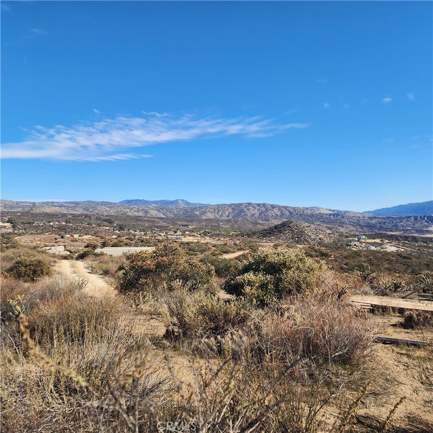 Discover the perfect blend of privacy and natural beauty on this stunning 9.11 acre lot in the serene community of Aguanga,California.   Nestled at an elevation of approximately 2500 feet,this secluded paradise offers breathtaking panoramic views of Mount Palomar, Mount Cahuilla and the surrounding mountains.  Imagine building your dream home where you can wake up to the awe-inspiring sunrises and enjoy the tranquility of country living at its finest. This expansive property is ideal for animals and all your outdoor activities offering endless possibilities for recreation and relaxation.  With plenty of space to grow your crops and fruit trees,vineyards etc. you can embrace a sustainable lifestyle while savoring the beauty of your own private oasis.  Conveniently located just 15 minutes from Temecula and it's renowned wineries, you'll enjoy the best of both worlds-peaceful rural living with convenient access to dining,shopping, and entertainment. Whether you're looking to create a family retreat, establish a hobby farm, or simply enjoy the quiet beauty of nature, this lot is a rare find. Don’t miss the opportunity to own this slice of paradise. Contact me today to explore all that this remarkable property has to offer!