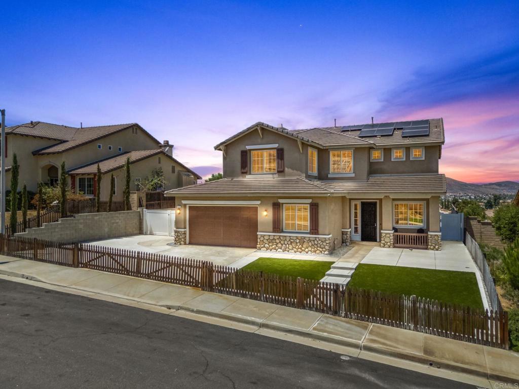 Welcome to your dream home in the heart of Menifee! This spacious 6-bedroom, 3-bath property offers over 3,250 square feet of thoughtfully updated living space on a quarter-acre lot—complete with RV parking and low-maintenance artificial turf in the front yard for effortless curb appeal. Inside, you’ll find a bright, open-concept layout with formal living and dining rooms, a large great room with a fireplace, and a gourmet kitchen featuring granite countertops, a center island, and a walk-in pantry—ideal for hosting or everyday living. A main-floor bedroom and full bath provide flexible options for guests, in-laws, or a home office. Upstairs, the expansive primary suite features a private view deck, walk-in closet, and spa-inspired bath, providing a serene retreat for you. You’ll also find a generous bonus room—perfect as a media room, game room, or additional lounge space for the whole family. The two-car garage boasts a sleek epoxy floor, providing added durability and style. Step outside to your backyard oasis with a sparkling PebbleTec pool and spa, framed by mountain views and room to entertain, relax, or play. Energy-efficient solar panels help keep your electric bills low. Located near top-rated schools, parks, and shopping, this move-in-ready home truly has it all.