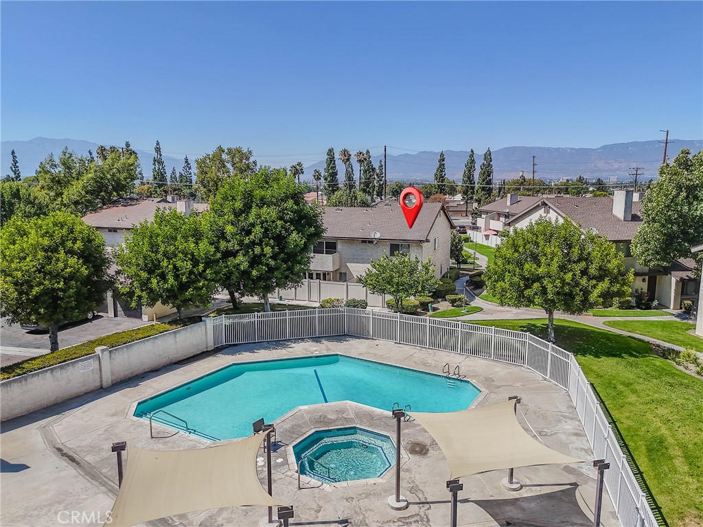 Welcome to this beautifully maintained 3-bedroom, 2.5-bath townhome in the desirable Indian Knolls community. Offering 1,442 square feet of living space, this home features an updated kitchen with a new stove and microwave, plus a refrigerator, dishwasher, washer, and dryer included. The spacious layout is designed for both comfort and functionality, while the private enclosed patio is ideal for relaxing or entertaining. Additional highlights include a detached 2-car garage and a location within walking distance to the community pool, private end unit. Conveniently situated close to Loma Linda University and Medical Center, shopping, and with easy access to the 215 and 10 freeways, this townhome combines comfort, convenience, and value in one great package.