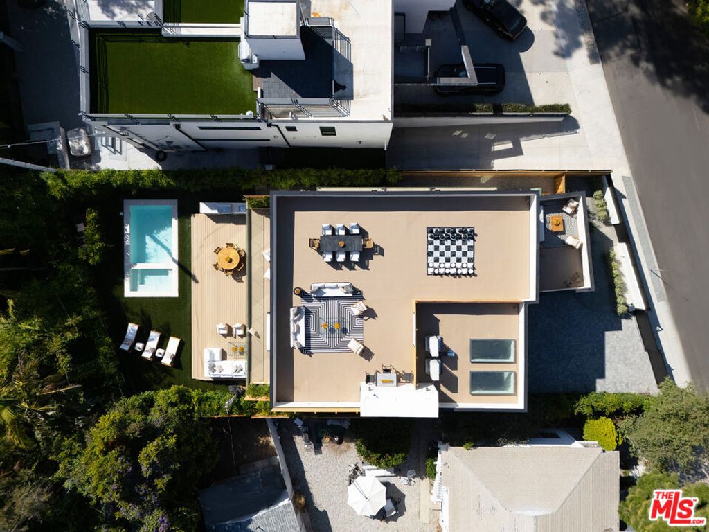 Photo of 1185 Mcclellan Drive, Los Angeles, CA 90049 (MLS # 25597539)