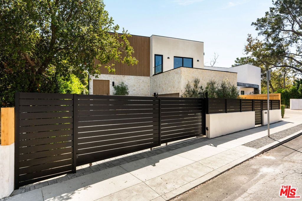 Photo of 1185 Mcclellan Drive, Los Angeles, CA 90049 (MLS # 25597539)