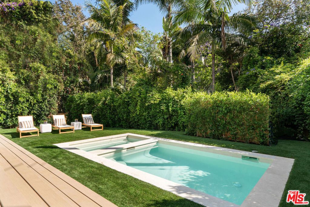 Photo of 1185 Mcclellan Drive, Los Angeles, CA 90049 (MLS # 25597539)