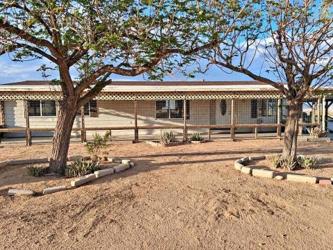 Photo of 922 Los Coyotes Way, Landers, CA 92285 (MLS # 219155221DA)