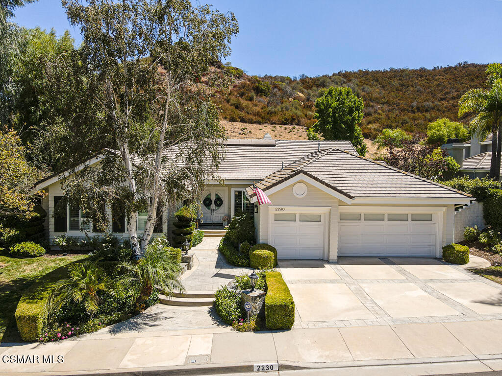 Situated on a quiet cul-de-sac on one of the most coveted streets in Three Springs, this bespoke property seamlessly blends luxury with comfort. Designed with a single-story layout, the versatile floor plan is ideal for any lifestyle, featuring four bedrooms and three bathrooms. Upon entering, you are welcomed by soaring ceilings enhanced with skylights that bathe the space in natural light. The light wide plank flooring, crown molding, custom wainscoting and baseboards provide clean lines and sophisticated taste throughout, while the pristine neutral wall paint offers a perfect canvas for displaying artwork. The heart of this home is its gourmet kitchen, a culinary masterpiece equipped with quartz countertops, premium appliances, a generous island with barstool seating, and ample cabinet storage. Adjacent to the kitchen is a charming dining area, accompanied by a remodeled powder room for added convenience. The private backyard is a true oasis, offering a grand saltwater pebble tech pool, spa, outdoor kitchen, and spacious patio area, perfect for year-round al fresco dining in sunny Southern California. Additional upgrades include new 3-inch wood plantation shutters throughout the home, new roof, dual-pane windows, new custom doors throughout the house, upgraded pool equipment, refreshed landscaping with custom lighting, and fresh exterior and interior paint. The three-car garage boasts epoxy flooring and built in cabinets for added storage. This stunning property is a rare gem, offering not only luxurious living but also the ultimate location in Westlake Village. Enjoy close proximity to the Westlake Lake, high-end retail shopping, fine dining, beautiful greenbelts, and award-winning schools. This stunning ranch style home is the epitome of elegant living!