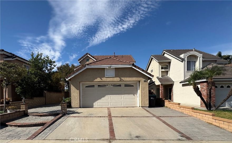 Welcome to this charming Chino Hills home featuring an open floor plan and spacious rooms throughout. Thoughtfully designed, it includes a convenient main floor bedroom, perfect for guests or a home office. The home has been well-maintained and offers a comfortable, inviting atmosphere. Ideally located near top-rated schools, major freeways, and a variety of shopping and dining options, this home provides both convenience and a great lifestyle