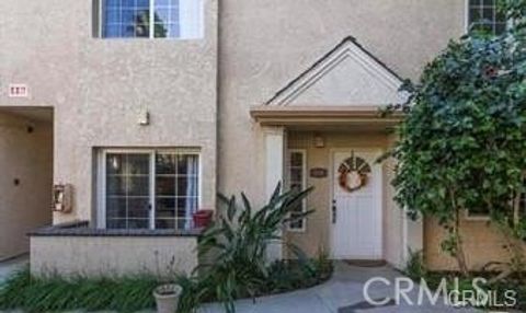 Photo of 7615 Glade Avenue #116, Canoga Park, CA 91304 (MLS # SR26056604)
