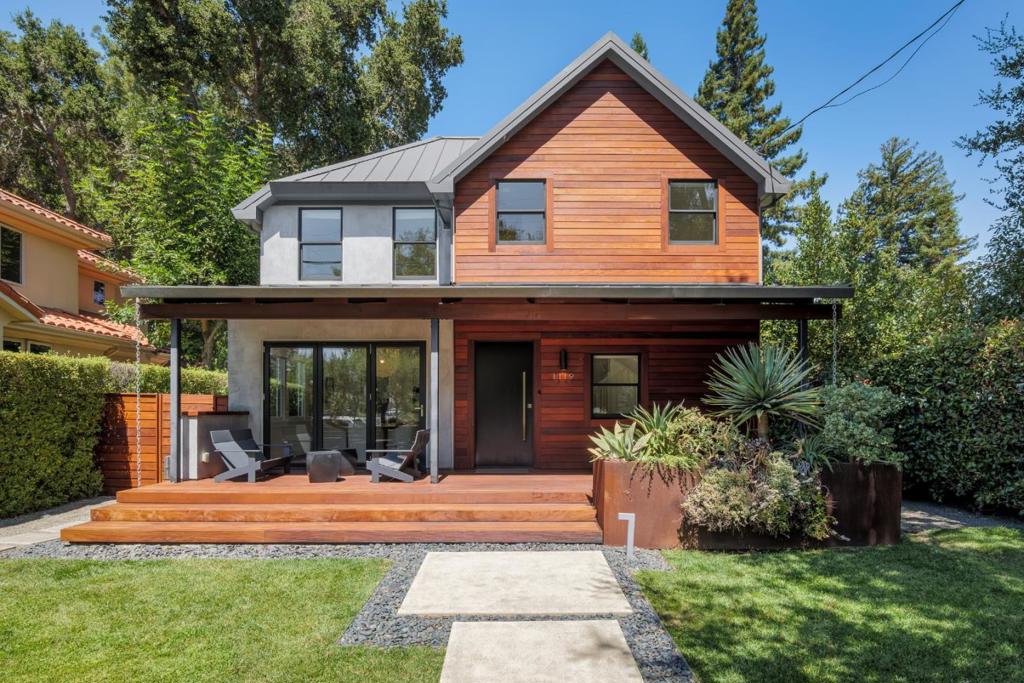 In the heart of Palo Alto's Community Center neighborhood, this modern residence blends stylish design, abundant natural light, and seamless indoor/outdoor living. The main level features an open-concept floor plan and Ipe decks at both the front & rear that extend the dining & living rooms outdoors. A chef's kitchen showcases Caesarstone countertops, custom cabinetry, and premium appliances. Upstairs, three bedrooms include a generous primary suite with spa-inspired bath, soaking tub, glass-enclosed shower, and walk-in closet.The light-filled lower level, with private exterior access, features a recreation room & wet bar, two additional bedrooms, a full bath, & laundry room. Oak flooring, smart home technology, and a detached, insulated 2-car garage underscore the home's quality, while the handsome stucco exterior and 24-gauge metal roof ensure timeless curb appeal. The fully fenced yard is framed by mature hedges and access to the garage is via a quiet alley. This prime location offers easy access to Rinconada Park & Pool, Lucie Stern Community Center, Junior Museum & Zoo, Childrens Library, & Rinconada Library. Just minutes from top-rated schools, downtown Palo Alto and Stanford University, a rare opportunity to own a home in one of the city's most sought-after neighborhoods.