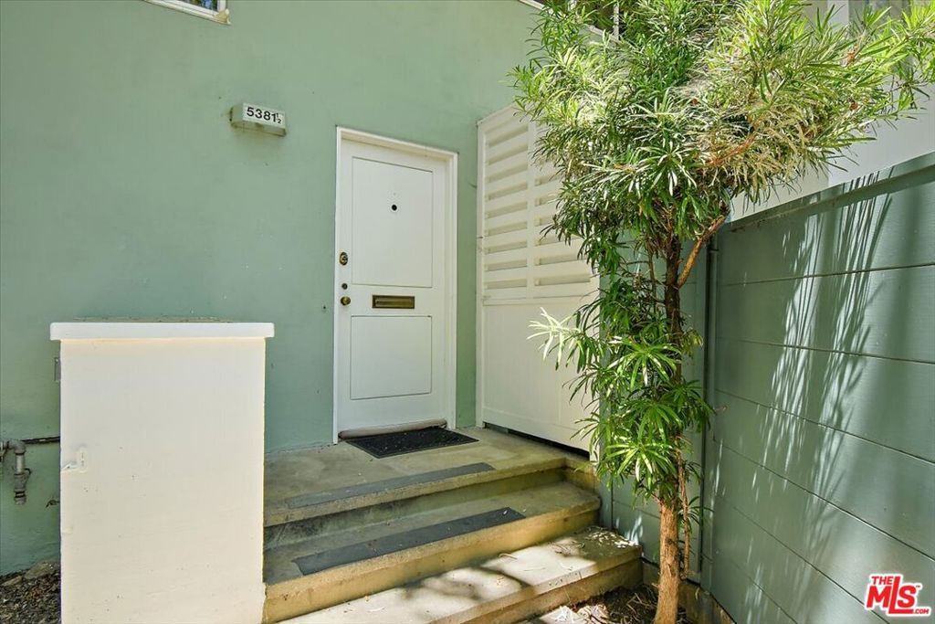 Photo of 5381 1/2 Village Grn, Los Angeles, CA 90016 (MLS # 25576221)