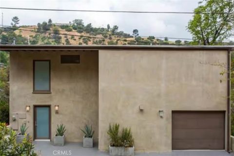 Photo of 2115 Groveland Dr, Los Angeles, CA 90046 (MLS # CV26085208)