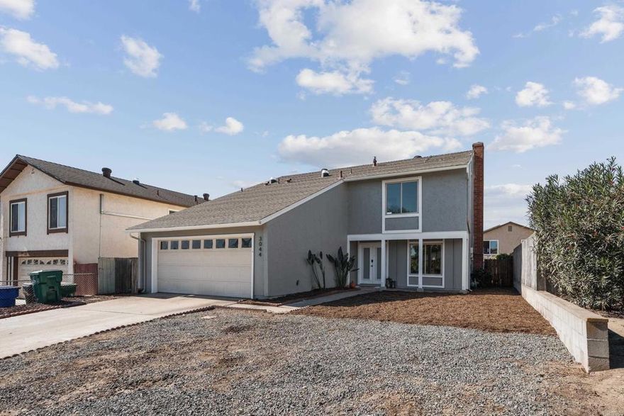 Welcome to this beautiful 4 bedroom/2.5 bath Paradise Hills gem situated in a great cul-de-sac near everything! This light-and-bright home features brand new paint and flooring, elegant ceiling fans, spacious living room with cozy fireplace adjoining the dining room, open kitchen and family room area. Large primary suite with large bathroom plus 3 additional large bedrooms. The wonderful backyard space is perfect for all of your gatherings. Located right near a great community park as well as freeways, lots of shopping and restaurants, and so much more. Welcome home!