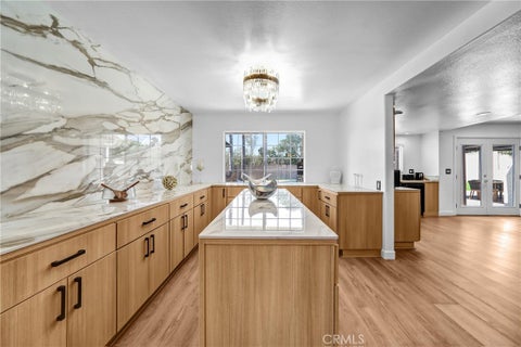 Photo of 11001 Limerick AVE, Chatsworth, CA 91311 (MLS # SR26227662)