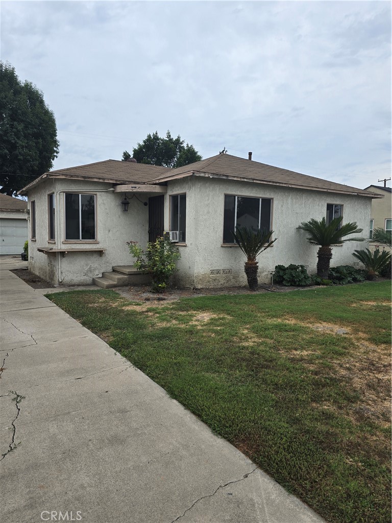 This mid-century home is on a huge 7,326 square foot in a Buena Park neighborhood that is on the rise! Remodel, rebuild, expand, and or build an ADU; check with the city about rule changes effective January 1, 2025, to align with California's SB 1211. The current home has two bedrooms, one bathroom, and 794 square feet. There is a detached two-car, 360 square foot garage. Those small footprints leave you with more than 6,000 square feet of flat, usable lot. Buena Parkis is centrally located between the LA and OC business centers and offers restaurants, shopping, parks, the Buena Park Train Station, Knotts Berry Farm and more. Close to downtown Fullerton and Brea, as well as the 5 & 91 freeways. Interest rates are down, don’t wait.