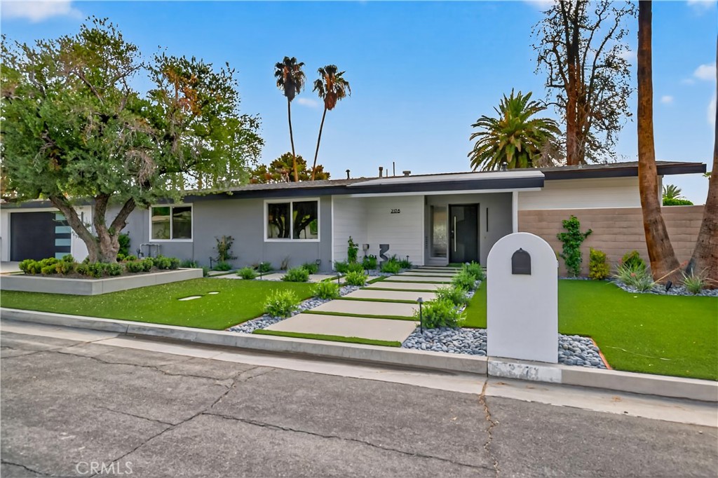 Beautifully Remodeled Mid-Century Home on Tahquitz Creek Golf Course!
Welcome to this stunning mid-century modern home located on the iconic Tahquitz Creek Golf Course, a premier public golf resort in Palm Springs designed by the renowned Ted Robinson. Originally designed by Alexander & Wexler, this residence seamlessly blends timeless architecture with contemporary updates.
Enjoy unobstructed golf course and breathtaking mountain views from this light-filled home, perfectly situated to take full advantage of its scenic surroundings. Featuring 3 spacious bedrooms and 4 fully remodeled bathrooms, the layout offers a highly desirable split floor plan—with the primary suite privately located on one side, complete with a large walk-in closet, and two guest bedrooms on the other. The newly remodeled kitchen is a showstopper—featuring brand-new appliances, sleek finishes, and a spacious island that invites you to gather around.
Vaulted ceilings and an open, airy design welcome you as you enter, drawing your eye straight through to the gorgeous backyard oasis. The home also includes a large, enclosed California room, ideal for morning coffee or evening cocktails while soaking in the desert beauty.
The backyard has been transformed into a true retreat, featuring a newly resurfaced pool with pebble finish, brand-new pool equipment and heater, a cozy fire pit, sitting area, and a new covered patio—all surrounded by impeccably landscaped grounds. The fourth bathroom lies between the house and garage for your backyard pool guests.
Additional highlights include: Fee simple ownership (no land lease), No HOA restrictions, New HVAC system, New roof, Move-in ready condition, remodeled inside and out.
This home captures the essence of Palm Springs living—mid-century charm, modern luxury, and panoramic views—all in one extraordinary package.