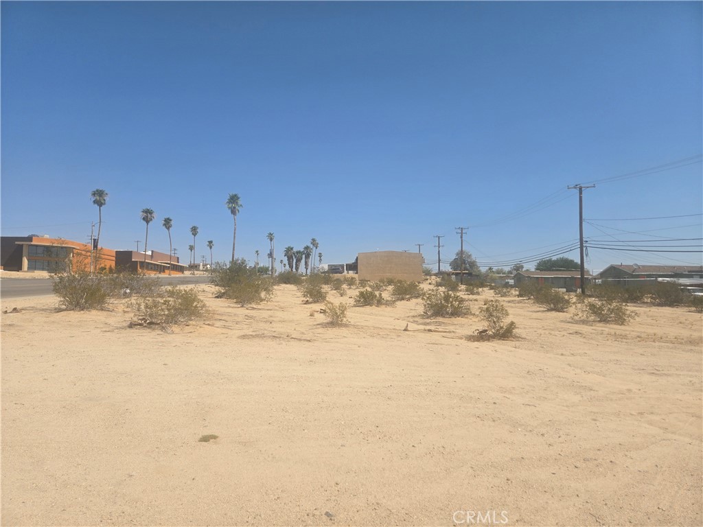 Commercial lot located at the heart of downtown Twentynine Palms. Adjoining lot with APN 0623-091-20-0000 is included in the sale totaling 13,020 sq ft. Seller has another parcel for sale on the same street with APN 0623-102-10-0000. Water and electricity on the street. The City of Twentynine Palms is home to the Joshua Tree National Park Headquarters and the Marine Corps Air Ground Combat Center, the world's largest Marine Corps training base. 2 minutes away from Tortoise Rock Casino. This town is going through a downtown revitalization effort thru Project Phoenix.