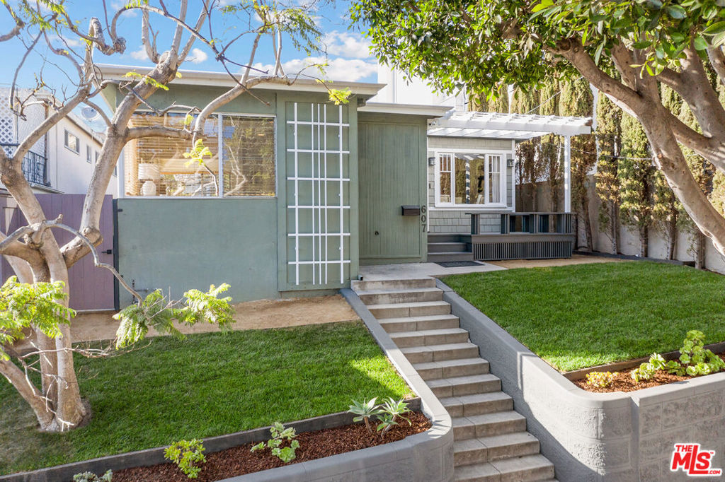 Investor goldmine, owner-user dream, or 1031 exchange perfection, 607 Ashland Ave is the kind of versatile opportunity that rarely hits the Santa Monica market. Situated just 4 blocks from the iconic restaurants and boutiques of Main Street and only 6 blocks to the beach, this prime duplex offers the ultimate coastal lifestyle with serious upside. The front unit is a chic 1-bed, 1-bath bungalow ideal for rental income or private use. In the rear, you'll find a spacious 2-bed, 1-bath unit with updated interiors and great natural light. Tucked behind that, you will find a fully detached studio, perfect for a home office, creative space, or added income potential. Whether you're looking to live in one and rent the others, maximize rental returns, or reimagine the footprint altogether, this is a location and layout that checks all the boxes: walkability, flexibility, and future appreciation.
