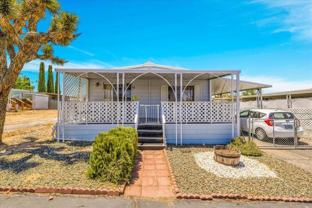 Beautiful double wide in the 55+ gated community of Aztec Estates. Located in the middle of the park, across from the clubhouse and pool.Aztec Community offers a gated community, pool, clubhouse with activities, indoor sauna, fitness center, billiard's room and a library.