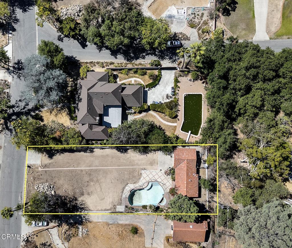 On one of Altadena's most treasured streets, 2509 Boulder Road sits in the Country Club neighborhood, just moments from the club, golf course, and the shops and restaurants of Mariposa Village. The flat 11,725 square foot lot is shaded by old-growth trees and mature plantings. An approximately 550 square foot casita, a two-car garage (both fully preserved), and a pool with spa remain at the rear of the property. This setting provided a poolside entertaining space between the home & casita giving it a private, resort like feel. Vegetation that has settled in over decades frames the area. The neighborhood still boasts many character homes, and the streets retain the calm beautiful vistas that define Altadena. Boulder Road is a quiet neighborly community and is not considered a drive through street. It retains its calm, tree lined, views of the mountains as well. This was once the site of an approximately 4,000 square foot two-story home, with five bedrooms and four bathrooms. With Phase 2 debris removal complete, the property is cleared and ready for what comes next. The land is being sold as-is.