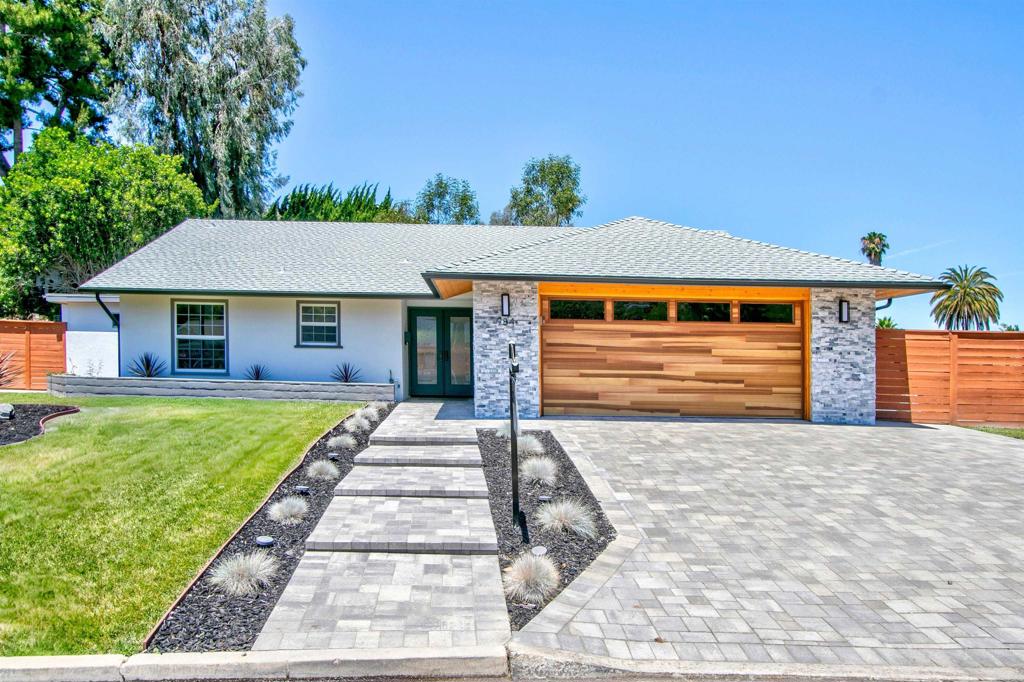 Discover this charming single-story ranch home in Lake San Marcos. Nestled along the golf course, this 2-bedroom plus bonus, 2-bath home offers generous expanded living space on an oversized 9,400 sq ft flat usable end-unit lot. The home features a newly replaced roof, extensive landscaping upgrades, fresh exterior paint, new fencing, and a beautifully modernized yard. Inside, recent updates include a remodeled kitchen and bathrooms, new flooring, windows, HVAC system with A/C and furnace, and fresh interior paint just completed Third bedroom has no door. The backyard offers ample space for entertaining or future expansion, all just moments from golf, dining, and the tranquil lakeside setting. Located in one of San Marcos’ most desirable neighborhoods, this home comes with no HOA fees. Residents can enjoy two nearby public golf courses, a full-size practice facility, lakeside restaurants, and the scenic beauty of Lake San Marcos. Optional golf club membership provides access to additional amenities, including a pool, tennis, and pickleball courts. Some photos have been virtually staged.