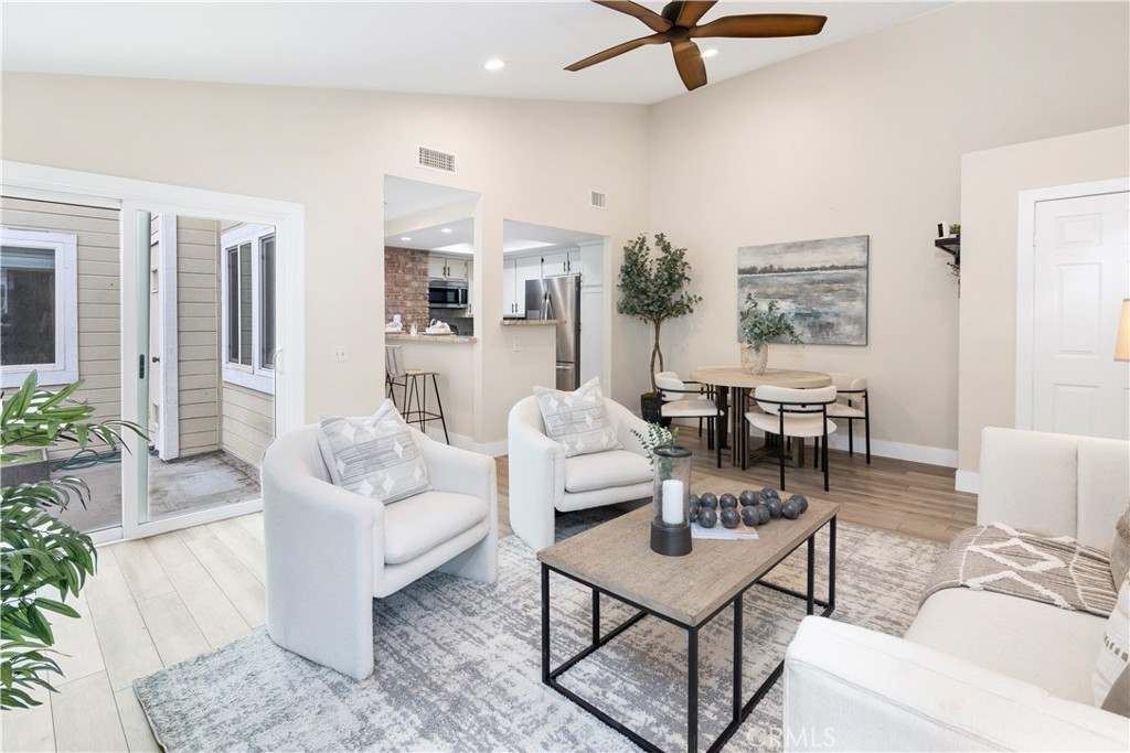 Step into this stunning 2-bedroom, 2-bath condo that truly outshines the model homes! Located in an award-winning school district, this home blends modern upgrades with cozy charm in all the right ways. You'll love the open-concept kitchen featuring a sleek new backsplash and updated counters and appliances.—perfect for cooking and entertaining. The charming brick accent wall adds a unique touch of character and warmth to the living space, making it feel like home from the moment you walk in. The spacious living room is large enough to accommodate a large sectional and is open to quaint patio. Enjoy the convenience of an attached 2-car garage and the serenity of your own private patio—ideal for relaxing with a cocktail while watching the sunset or enjoying a quiet morning coffee. This home is immaculate, move-in ready, and truly a rare find in a highly sought-after neighborhood. Don’t miss your chance to own this beautifully upgraded gem!