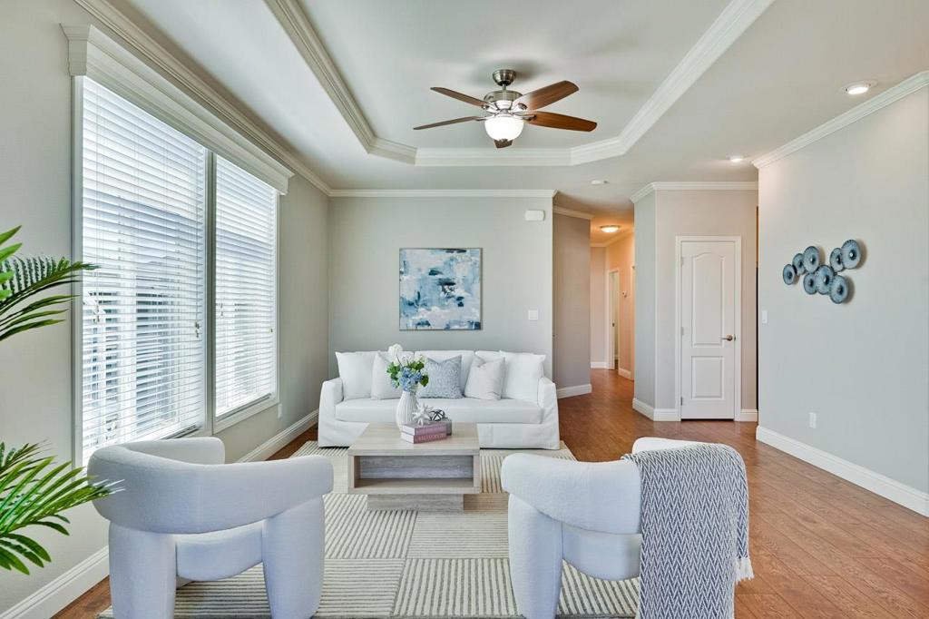 Welcome to this beautiful 3-bedroom, 2-bathroom mobile home locates within the Santa Clara Unified School District. The spacious kitchen is equipped with modern amenities including granite countertops, stainless steel Whirlpool appliances, Alderwood cabinets, a dishwasher, a microwave, oven range, pantry and refrigerator,The open floor plan includes a formal dining area,a combined kitchen/family room, providing ample space for family gatherings. Enjoy the ease of laminate flooring throughout the common area and cozy up in the living room. High ceilings and a walk-in closet add to the luxurious feel of the home. For your convenience, the house also features central forced air heating, central AC and ceiling fans for year-round comfort. The laundry area comes with a nearly new high quality washer and dryer, making move-in a breeze.Wheelchair lift in the carport area making it accessible if you have challenges with steps. Beautiful complex loaded with amenities for fun living. Pools * saunas * card rooms * exercise rm * Bar B Q area * large banquet hall. Central location in the heart of Silicon Valley * 1 block from light rail * Great location inside the park. Don't miss the opportunity to own this delightful home in the heart of Sunnyvale