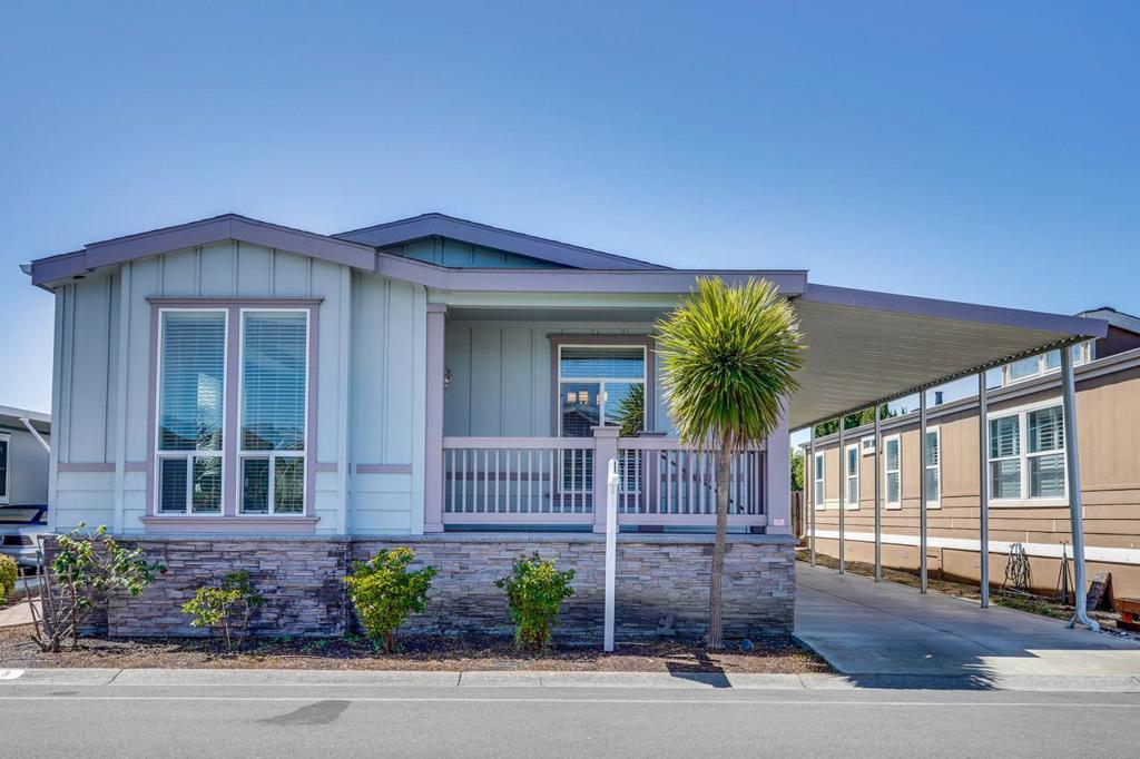 Welcome to this beautiful 3-bedroom, 2-bathroom mobile home locates within the Santa Clara Unified School District. The spacious kitchen is equipped with modern amenities including granite countertops, stainless steel Whirlpool appliances, Alderwood cabinets, a dishwasher, a microwave, oven range, pantry and refrigerator,The open floor plan includes a formal dining area,a combined kitchen/family room, providing ample space for family gatherings. Enjoy the ease of laminate flooring throughout the common area and cozy up in the living room. High ceilings and a walk-in closet add to the luxurious feel of the home. For your convenience, the house also features central forced air heating, central AC and ceiling fans for year-round comfort. The laundry area comes with a nearly new high quality washer and dryer, making move-in a breeze.Wheelchair lift in the carport area making it accessible if you have challenges with steps. Beautiful complex loaded with amenities for fun living. Pools * saunas * card rooms * exercise rm * Bar B Q area * large banquet hall. Central location in the heart of Silicon Valley * 1 block from light rail * Great location inside the park. Don't miss the opportunity to own this delightful home in the heart of Sunnyvale