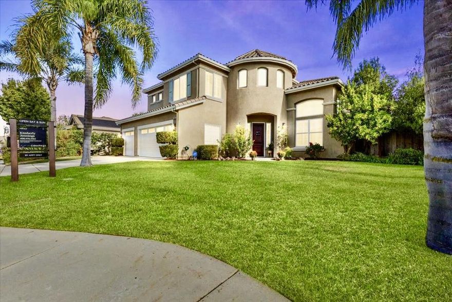 Welcome to your dream home in the highly sought after neighborhood of Mission Ranch.  This stunning 5 bdrm, 3.5-bath gem spans 3,401 sqft on a 9,234 sqft lot. Impeccably designed, with an open floor plan, vaulted ceilings, wood floors, recessed lighting and an abundance of natural light. The main level features a large bedroom with en-suite bath, separate family room and an elegant formal dining room ideal for memorable gatherings. The chefs kitchen dazzles with SS appliances, granite countertops, island, wine fridge,double ovens & butlers pantry. Upstairs find 3 additional bedrooms, including a luxurious primary en-suite and bath, loft or (5th bdrm) and a dedicated office space. Outside, a backyard oasis awaits you, complete with a covered patio, lush landscaping, a heated pool and jacuzzi creating an ideal setting for entertaining and plenty of relaxation. Eco-friendly features include owned solar and an EV charger in your 3 car garage. Steps away, enjoy a community park with tennis and basketball courts, pickleball, hiking and biking trails. Close to 101 freeway, ideal for commuters, and less than a mile from downtown Morgan Hill's vibrant restaurants and shops. Don't miss your opportunity to embrace the coveted Mission Ranch lifestyle in this exceptional home.