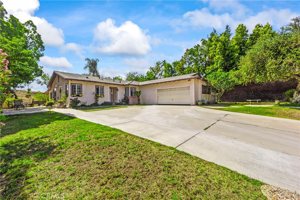 Charming Mid-Century Pool Home on a Spacious Lot!
Welcome to this delightful single-story residence in the heart of Corona! Built in 1957, this well-maintained home offers 3 bedrooms, 2 bathrooms, and 1,409 sq ft of living space on an expansive 14,374 sq ft lot. Enjoy California living at its finest with a sparkling swimming pool, generous yard space perfect for entertaining, gardening, or play, and attached two-car garage.
Step inside to find tile flooring through out and a cozy fireplace that adds warmth and charm to the living area. The kitchen and living spaces are full of potential and await your personal touch. This home is being sold as-is, providing an excellent opportunity for customization or investment.
Conveniently close to shopping, dining, and commuter routes.
Don’t miss this chance to own a pool home on a large lot in one of Corona’s established neighborhoods!