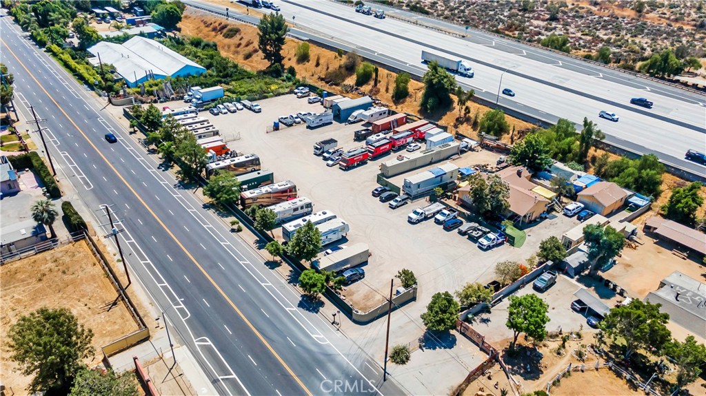 Excellent income producing property in Sylmar for investor/developer/owner/user. High visibility location along 210fwy. Over 400ft of road frontage on Foothill Blvd. Current use RV and Truck storage/parking. Property has 2 entry gates. Property has a home on it with a tenant. According to the seller, the overall monthly income is $32,000. According to the seller, this property is suitable for church, preschool, mobile home, RV park, landscaping nursery or animal feed retailing with C.U.P. New central AC system installed in 2019.