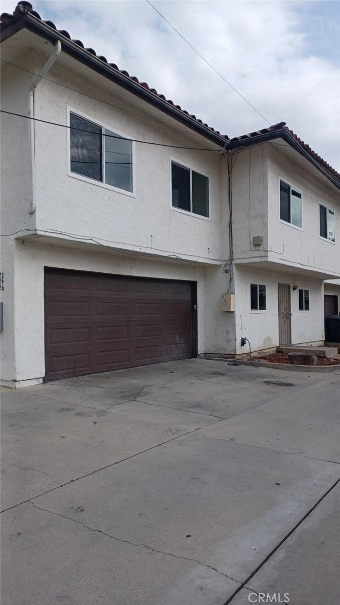 4 large bedrooms 2.5 baths 2 car attached garage plus 3 assigned parking , private patio with washer dryer hook ups in garage central heat/air condition, brand new double pane windows , fresh paint all over , brand new stove and hood, newer kitchen cabinets , Quartz counter tops brand new laminate flooring in all bedrooms and baths, basically all remodeled, light and bright rooms ,good size private patio, unit located near end of cul-de-sac (no through traffic) with extra parking in the back , quiet neighborhood ,close to schools , shops and freeways , perfect for families with kids rent includes water ,trash and sewer