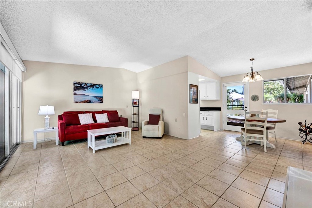 Welcome to this 2 bedroom, 1.5 bath home offering 953 sq ft of comfortable living in Laguna Woods! The home is the popular San Sebastian model, thoughtfully designed for single-level living with no stairs and no one above or below. Laguna Woods is a premier 55+ community, and this vibrant, recreationally focused neighborhood is the perfect place to enjoy life at your own pace. Step inside to find a bright living room with access to a private covered patio—an ideal spot to relax with a good book in a quiet, peaceful setting. The layout also includes both a front and back entrance, a shared courtyard, and a second private patio that welcomes refreshing cross breezes throughout. Beyond the home, the community offers an array of exceptional amenities including golf courses, fitness centers, multiple pools, a restaurant and lounge, clubs, and an equestrian center with riding areas. With easy access to freeways, shopping, fine dining, and entertainment, this community truly has it all.