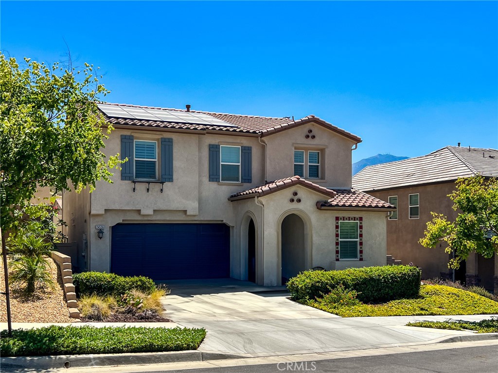 Welcome to your dream home in the highly sought-after Terramor Community! This exceptionally upgraded residence combines modern luxury, energy efficiency, and comfort—perfect for today’s lifestyle. Offering an open-concept floor plan designed for both entertaining and everyday living, this home truly has it all. Nestled at the end of a quiet cul-de-sac and perched on an elevated lot, you’ll enjoy being just steps away from top-tier community amenities. Key Features: Spacious, Open Concept Floor Plan with gorgeous wood vinyl flooring throughout the main level. Gourmet Kitchen with sleek Quartz countertops, full backsplash, and premium Whirlpool appliances. A stunning Kohler Whitehaven apron-front sink and under-cabinet lighting create the perfect cooking space. Great Room with crown molding, upgraded baseboards, 6 LED lights, and pre-wired for a flat-panel TV—perfect for movie nights and family gatherings. Bi-fold Patio Doors seamlessly open to a California-style covered patio with recessed lighting and an exterior ceiling fan, ideal for year-round outdoor entertaining. Main Floor Bedroom and Full Bathroom – great for guests or multi-generational living. Upstairs Loft with 4 LED lights, perfect for an office or additional living space. Large Primary Suite, pre-wired for a flat-panel TV, and an elegant en-suite bathroom featuring a custom-tiled shower and separate acrylic tub for ultimate relaxation. Freshly painted and featuring new Berber carpet throughout the upper level, plus woven wood shades in most rooms for added style and comfort. Finished 2-Car Garage prewired for a Level 2 car charger, with a roll-up door and remote access. Energy-Efficient Features: Solar Panels—designed to reduce energy costs and increase sustainability. Enjoy the benefits of green living while keeping utility bills in check. Tankless Water Heater—providing on-demand hot water, energy savings, and efficiency for your home. Exterior: Professionally Landscaped Front and Rear Yards—low maintenance and high curb appeal. Located in a secure gated community, offering peace of mind and access to exclusive amenities everyone in the family will enjoy. This home is truly one-of-a-kind, combining modern luxury with energy-efficient living in a vibrant community. Whether you’re relaxing in your private backyard or enjoying the fantastic amenities in Terramor, this home offers the best of both worlds: comfort and sustainability. Don’t miss your chance to own this incredible home!