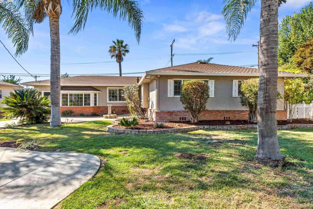 Parkmont Perfect! Welcome to 38011 and 38009 Temple Way - TWO lovely homes located in the prestigious Parkmont Elementary School attendance area * The main home is 3 bedrooms, 2 bathrooms, 1774 sq ft and features fresh interior and exterior paint, LVP flooring, an updated kitchen and modernized bathrooms! The 2nd home offers 2 bedrooms, 1 bathroom and approximately 720 sq ft of efficient living space with upgrades that include laminate flooring & new recessed lights * Infrastructure improvements include dual pane windows, copper piping, some newer fences * An extremely generous 10,572 sq ft lot features fruit trees, an array of seasonal flowers and a large shaded deck for easy outdoor entertaining * Inside laundry rooms * 2-car garage * Excellent location, near Shinn Park, Quarry Lakes, Centerville Community Center, Whole Foods Market, ACE Train & so much more! Open Saturday & Sunday 1:00pm to 4:00pm!