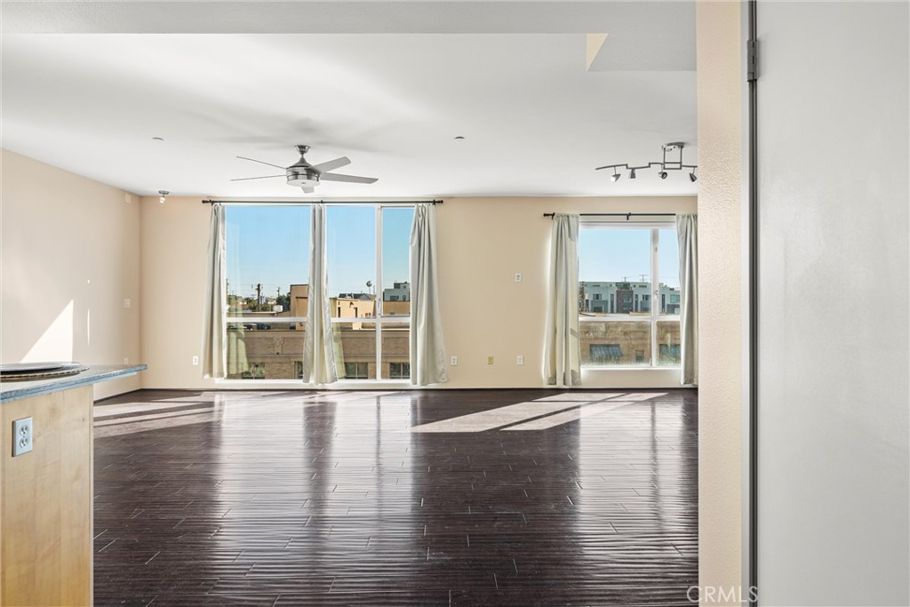 Amazing Fourth floor END UNIT with gleaming elegant 3/4 inch Wood Flooring, Floor to Ceiling Windows invites Natural Light and Southeast Sweeping Views of Los Angeles Harbor to South San Pedro, Freshly painted from all walls AND ceiling, Washer and Dryer in unit designated closet, Wide open exposure from a splashing bright entry with a fantastic kitchen, wide granite counter top for multi use as a breakfast area connecting the bright living room for openness. Outside the unit consider enjoying a very large and dual tiered community patio with multiple tables and benches with gas barbque stations. two side by side underground secured parking spots, and EV charging stations, guest parking access through 7th street. WALK to The most amazing Port Town Brewery, La Siciliana, Buonos, 'Nikos and Raffaelos Italian eateries, Sebastians Mediterranean, Barrami Thai restaurant, Senfuku Japanese eatery, Kalaveras, Think Cafe, Mexican Food, Art galleries, The Port of Los Angeles, San Pedro Fishmarket, Harbor Boat Cruises, ALL WITHIN A 3 BLOCKS RADIUS!!!
This Condo/Loft is also for sale at $608,888.88 find it in MLS # SB25016414