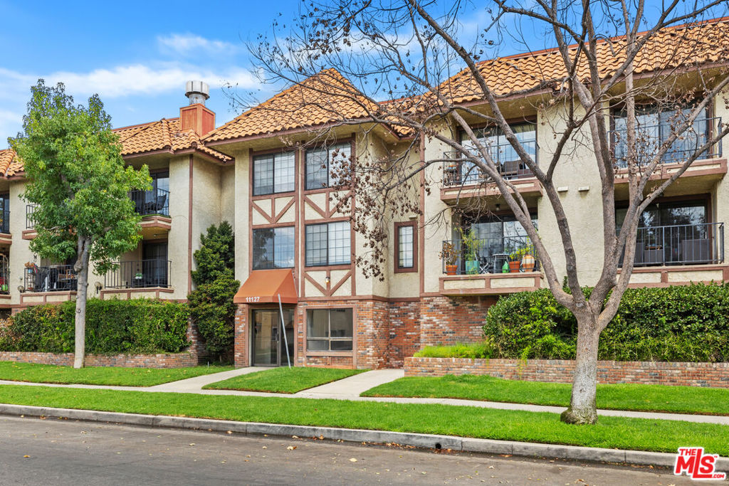 Welcome to this front-facing 3-bedroom townhouse in the heart of the NoHo Arts District, located on a quiet, tree-lined street. The light-filled living area features hardwood floors, recessed lighting, and a remodeled kitchen with stainless steel appliances, a pantry, and a laundry area. A glass door opens to a covered patio, perfect for outdoor dining or relaxing. The main level includes the living and dining spaces, kitchen, and a guest powder room. Upstairs, you'll find three spacious bedrooms, including an oversized primary suite with a sitting area. One bedroom is currently used as an office and includes a second laundry area and a private terrace with views of the hills. All bedrooms offer generous closet space. The well-maintained complex includes an open-air courtyard, large swimming pool, jacuzzi, and lounge areas. Additional features include two side-by-side parking spaces, lobby entry with elevator access, and extra storage space for the unit. Full of creative energy, the lively NoHo Arts District is dotted with acting and dance studios, plus a variety of performance venues like the historic El Portal Theatre, originally built in 1926. The Television Academy's Hall of Fame Garden showcases sculptures of legendary Emmy winners such as Lucille Ball and Bob Hope. Just steps away, trendy cafes, gastropubs, and tiki bars mix with vintage shops along Lankershim and Magnolia boulevards.