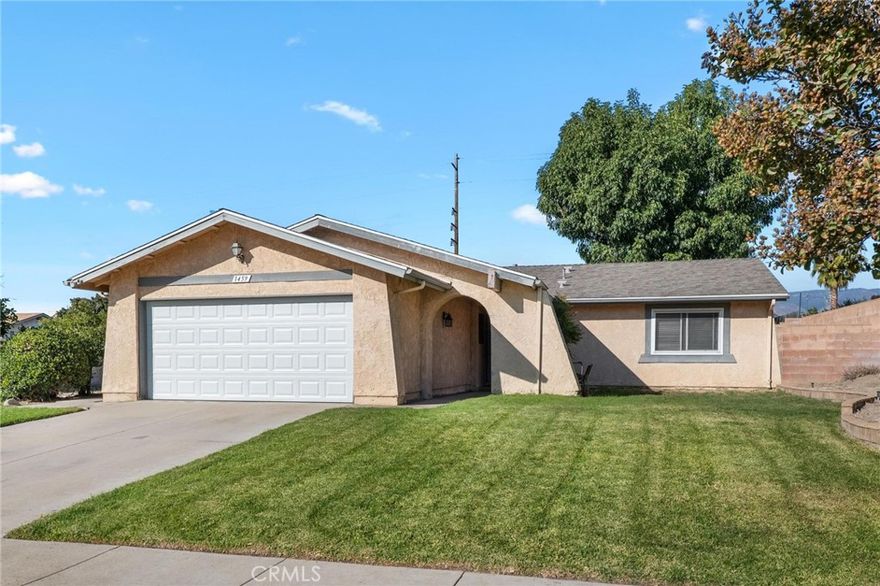 Come and make this incredible home in the city of Redlands yours! This home is in a great location, near shopping, restaurants, parks, and much more! Upgrades include tile flooring throughout the entire home, remodeled bathrooms, updated quartz countertops in the kitchen, NEW ROOF installed in 2020, and a 220V outlet in the garage to charge an electric vehicle! Enjoy the landscaped yard and mature fruit trees with the family! Hurry and schedule a tour today!