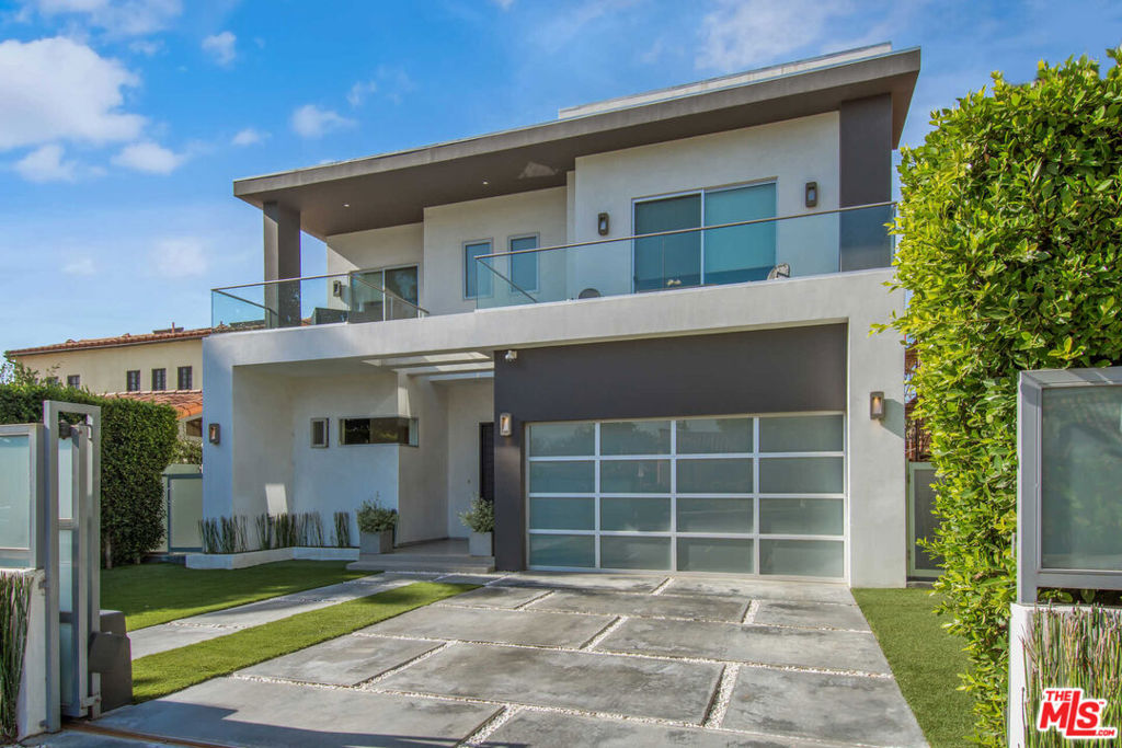 LONG TERM LEASE OPPORTUNITY! Behind secure gates and lush privacy hedges lies a striking five-bedroom modern masterpiece that blends elegance, functionality, and indoor-outdoor living at its finest. Soaring ceilings and expansive, light-filled interiors create a sense of effortless sophistication the moment you step inside. The main level is designed for grand-scale entertaining, with generous living and dining areas that flow seamlessly into a sleek European chef's kitchen outfitted with top-of-the-line Miele appliances. Massive sliding glass doors vanish to reveal a private backyard oasiscomplete with a covered alfresco dining space, sparkling pool, and spaperfect for relaxing or entertaining under the California sun. Five luxurious en-suite bedrooms are thoughtfully arranged, with one conveniently located on the main floor and four upstairs, including an opulent primary suite featuring a walk-in closet, spa-inspired bath, and a serene private deck overlooking the lush yard. Three additional balconies offer tranquil outdoor escapes throughout the home. State-of-the-art amenities include Control4 home automation, a comprehensive security camera system, integrated speakers, automated shades, and a motorized gate. Ideally situated in a prime location, just moments from The Grove, premier shopping and dining, Blue Bottle Coffee, and with easy access to West Hollywood, Beverly Hills amd Century City.