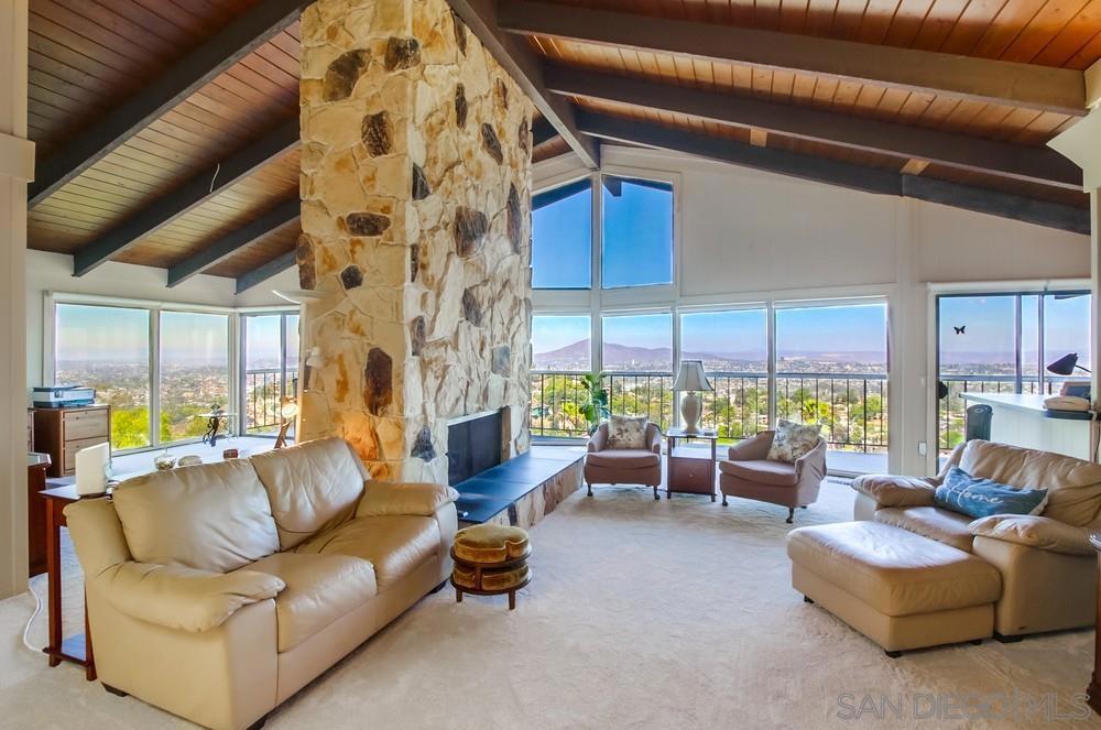Legacy home in the prestigious community of Mt. Helix with an amazing unobstructed view facing West, North and East. This custom built home built in 1975 has 3 bedrooms & 3 baths & sits on a half acre lot. Very private property perched high on the hill. Large, cozy living room & large family room share a see through, stone fireplace with vaulted ceilings and brand new carpet. The home features a spacious master bedroom with floor to ceiling, corner windows that capture the serene, panoramic vistas all the way to the ocean. This is a legacy home waiting for the new owner to make it their own. There is a 3 car, detached garage as well as a 2 car carport. A manageable front yard with automatic sprinklers and a beautiful Meyer lemon & tangerine trees. 2 Large bedrooms on the opposite side from the master with a very large bathroom in between. Plenty of storage and land below. This home has only had one owner who built the home in1975.
