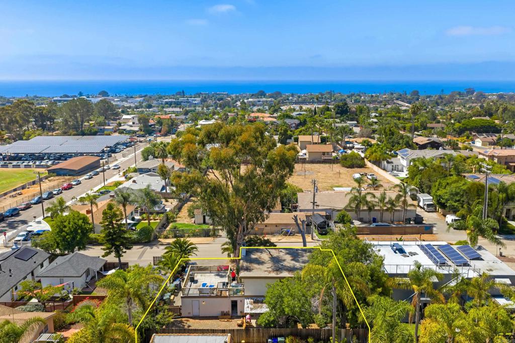 Classic duplex with great ocean views on a quiet street lined with luxury residences. Come tour this highly usable oversized lot with amazing optionality: design yourdream home while earning rental income; improve the units to optimize cash flow; land bank for appreciation; or rent one unit and live in the other to enjoy OldeEncinitas and everything North County has to offer. SEE video and brochure! (click: ‘virtual tour’ or 'interior')