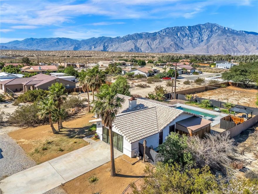 Gorgeous upgraded pool home in Historic B-Bar-H! Beautiful landscaping, sparkling pool, and fenced rear yard with Chuckwalla Trail access. Features remodeled kitchen, Anderson dual-pane windows, updated master suite, and cozy gas fireplace. Finished garage doubles as entertainment room with bar and pool table. Enjoy stunning San Jacinto Mountain views and sunsets from the covered patio. Offered turn-key furnished (furniture package outside escrow). Short Term Rentals are allowed—currently active Airbnb!
