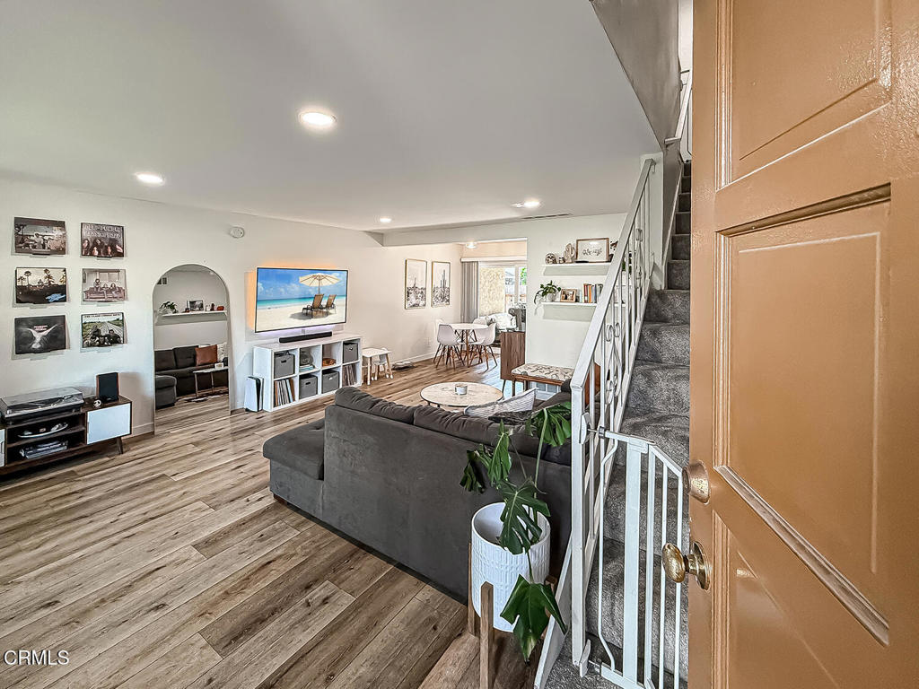 Stylish Remodeled End-Unit Townhome with 2 separate Private Garages & Outdoor Retreat. HOA dues include water, sewer, trash and insurance (buyer to verify)Welcome to this beautifully upgraded 3-bedroom, 2-bathroom end-unit townhome, perfectly situated near Moorpark College, shopping, dining, and convenient freeway access. Offering the feel of a detached home with no neighbors above or below, this rare property combines modern comfort with low-maintenance living.Step inside to find a thoughtfully updated interior featuring brand-new windows and sliders, newer vinyl plank flooring, fresh wall texture and paint, and a light-filled open-concept layout. The remodeled kitchen with newer appliances flows seamlessly into the living and dining areas, while updated bathroom vanities add a stylish touch.Enjoy the ease of a private, direct-access 2-car garage (not shared), plus an additional private tandem garage--rare in this community. The garage includes extra storage or the flexibility for a home gym or workshop.Outdoors, the spacious private patio is enhanced by a mature orange tree, creating the perfect space to relax or entertain. With its modern upgrades, turnkey condition, and unique combination of privacy and functionality, this home is truly a standout.Don't miss your chance to own this exceptional property--schedule a showing today!